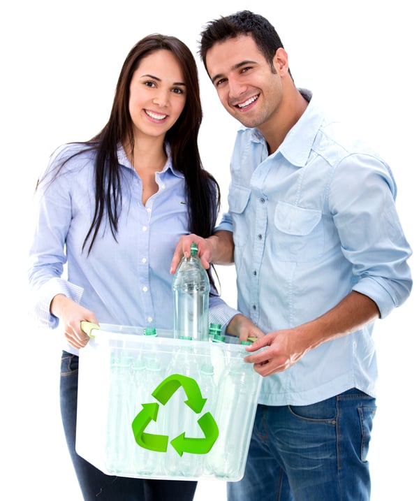Green couple recycling bottles - isolated over a white background