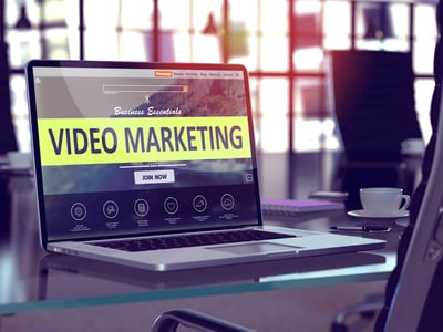 Video Marketing Concept. Closeup Landing Page on Laptop Screen on background of Comfortable Working Place in Modern Office. Blurred, Toned Image. 3d render.