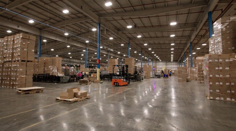 Warehouse team scaling snack multipack production lines during peak seasonal surge fulfillment